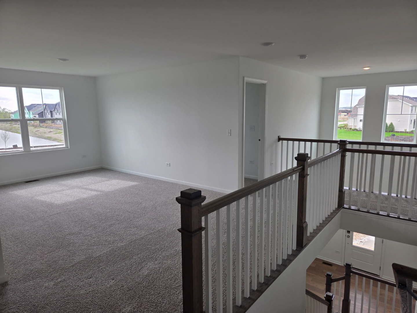 17431 Victoria Lane Lockport, IL 60441 - Photo 7 of 20 a view of an empty room with windows
