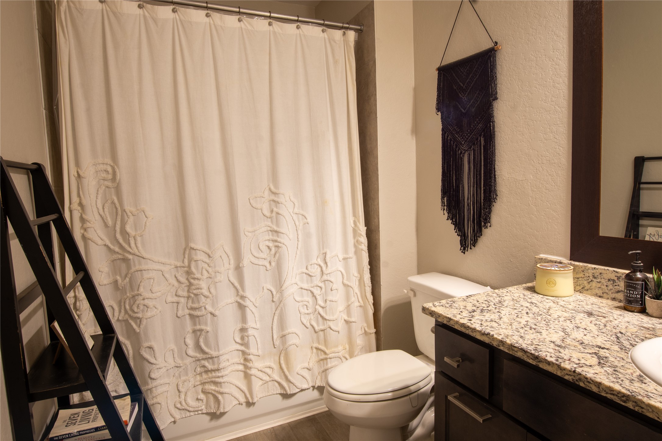 38340 Park View Drive Hempstead, TX 77445 - Photo 15 of 25 a bathroom with a granite countertop sink toilet and shower