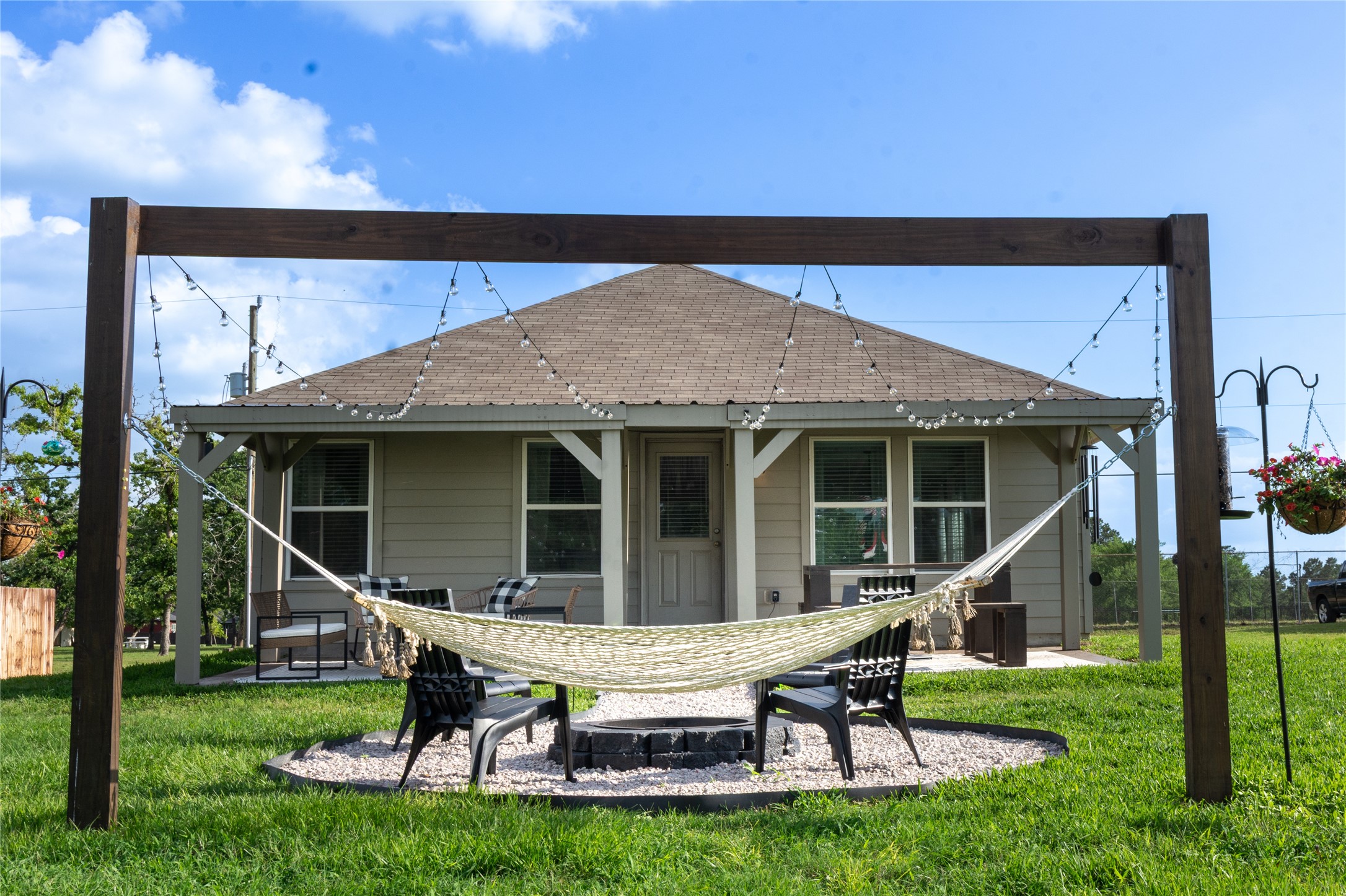 38340 Park View Drive Hempstead, TX 77445 - Photo 18 of 25 a house view with a seating space and garden