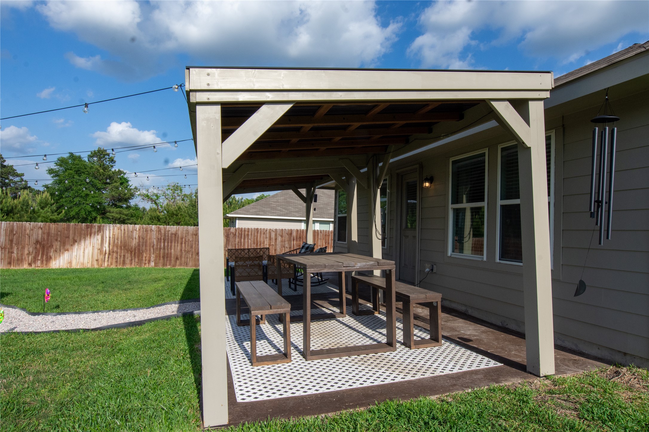 38340 Park View Drive Hempstead, TX 77445 - Photo 21 of 25 a view of backyard with barbeque grill and outdoor seating