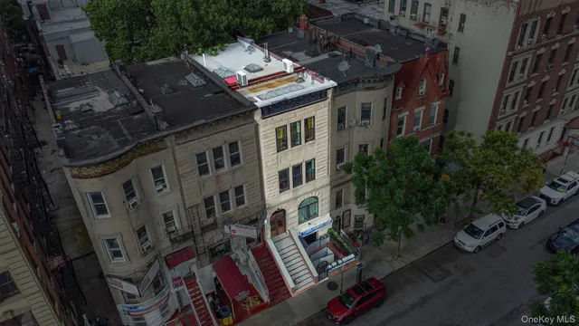 a front view of a building with garden