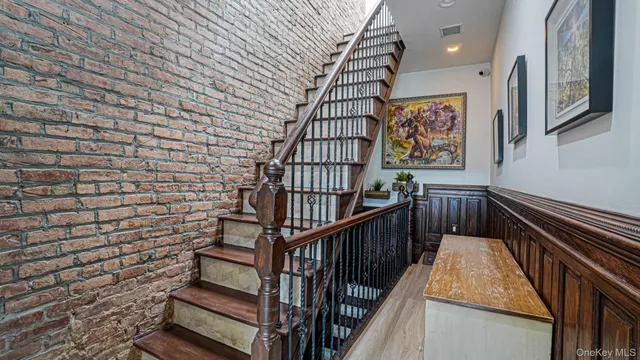 a kitchen with a refrigerator and a stove top oven