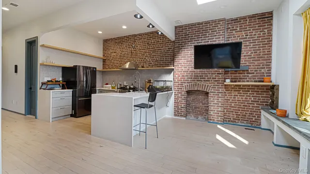 a kitchen with stainless steel appliances granite countertop a stove and a sink