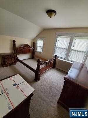 24 Washington Place, Unit 2 Teaneck, NJ 07666 - Photo 8 of 12 a living room with furniture