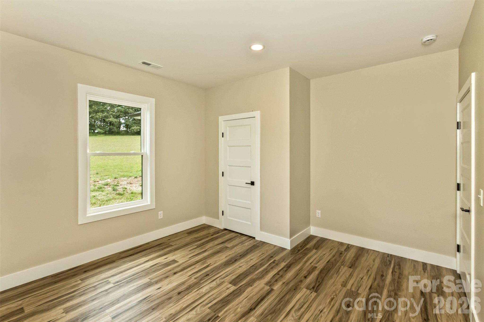 112 Peyton Elaine Road Clyde, NC 28721 - Photo 24 of 35 a view of an empty room and window