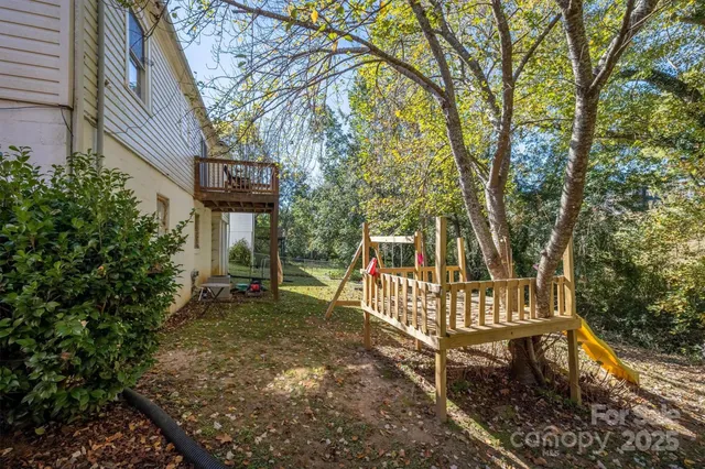 a view of a bench in a backyard