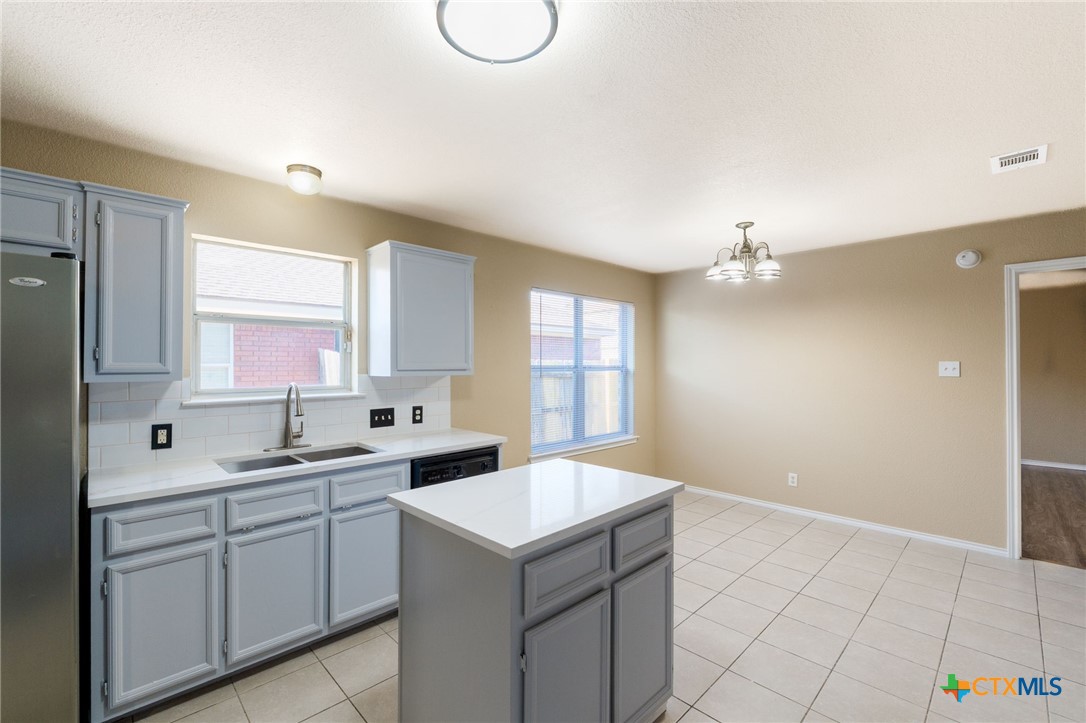 4701 Neta Drive Killeen, TX 76549 - Photo 11 of 28 a kitchen with a sink cabinets and window