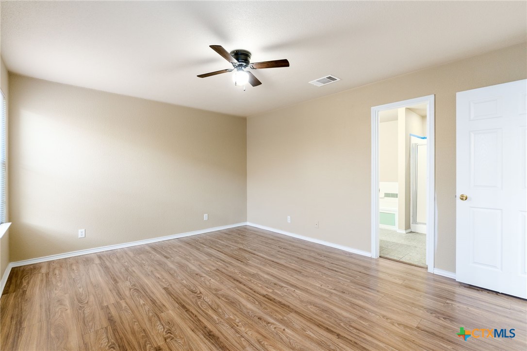4701 Neta Drive Killeen, TX 76549 - Photo 13 of 28 a view of an empty room with wooden floor