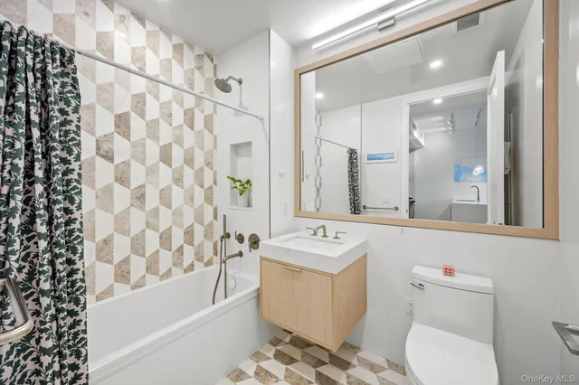 a bathroom with a sink and a toilet