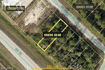 546 Meadow Road Lehigh Acres, FL 33973 - Photo 1 of 1 a blue sign that is on the side of a building