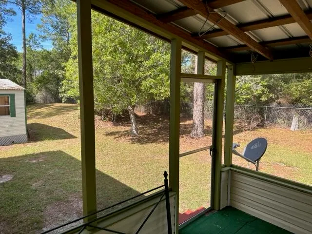 a view of a porch with a table
