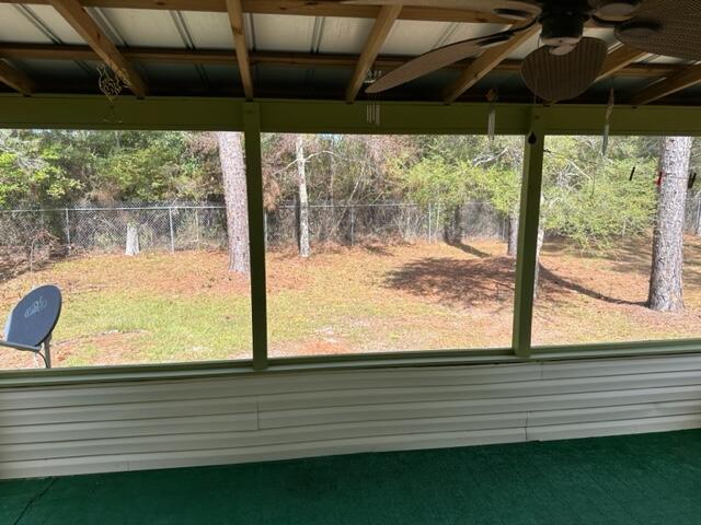 60 Magnolia Court Freeport, FL 32439 - Photo 19 of 29 a view of a porch with a table