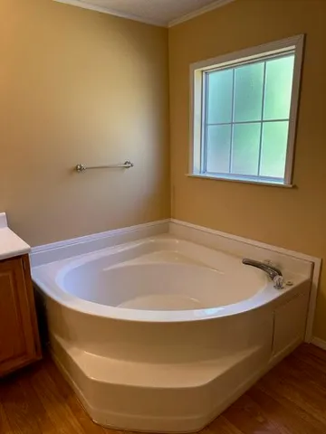 a view of a bathtub in a room
