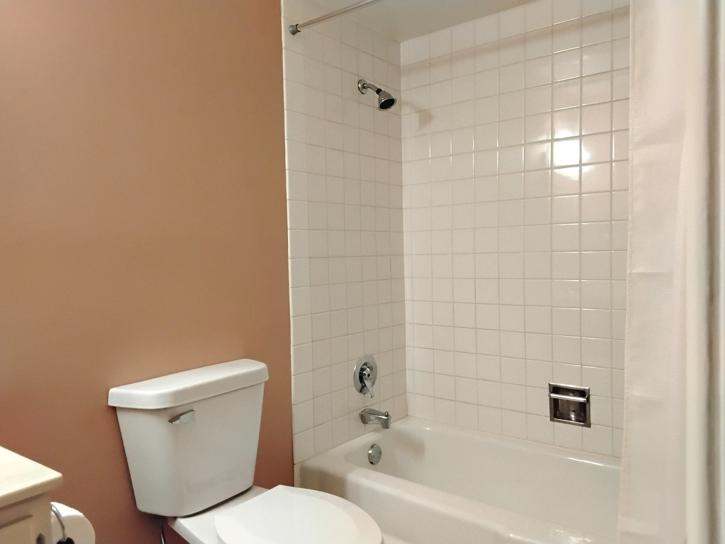 12721 Park Place, Unit 2B Crestwood, IL 60418 - Photo 7 of 12 a white toilet sitting next to a bath tub