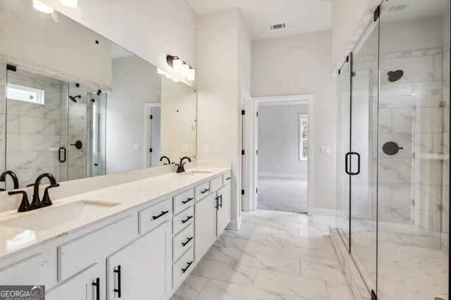 a view of a patio with table and chairs