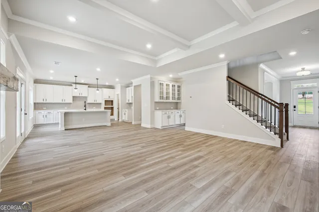 a living room with a fireplace and a window