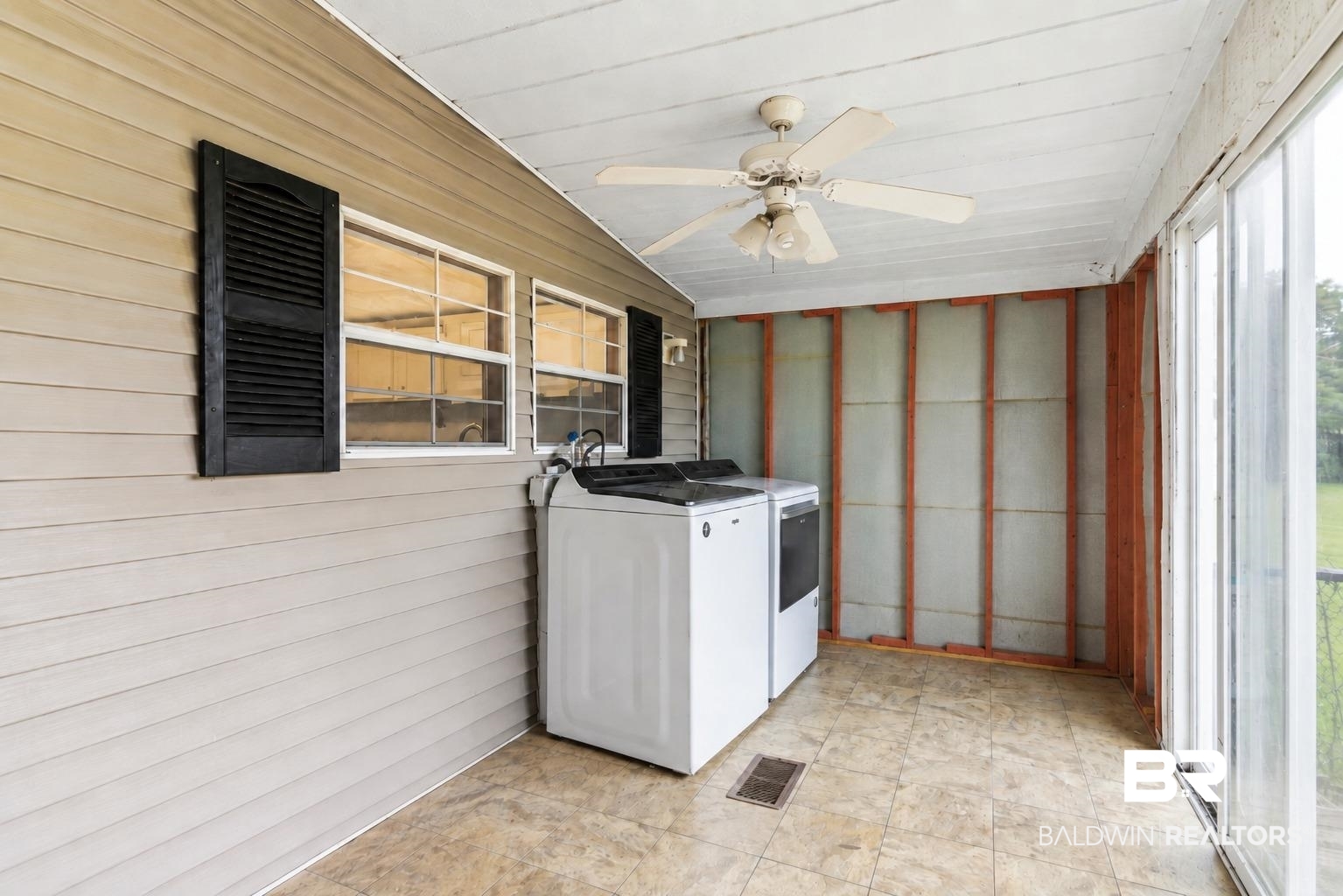 26788 Feely Road Elberta, AL 36530 - Photo 17 of 31 Screened porch with tile flooring and a ceiling fan