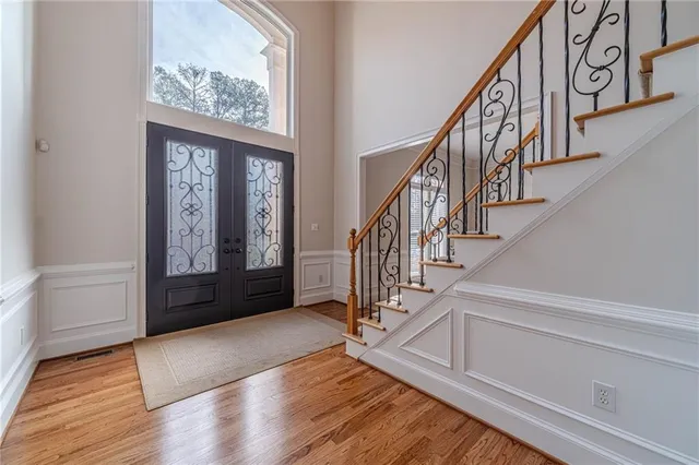 a view of a hallway with stairs