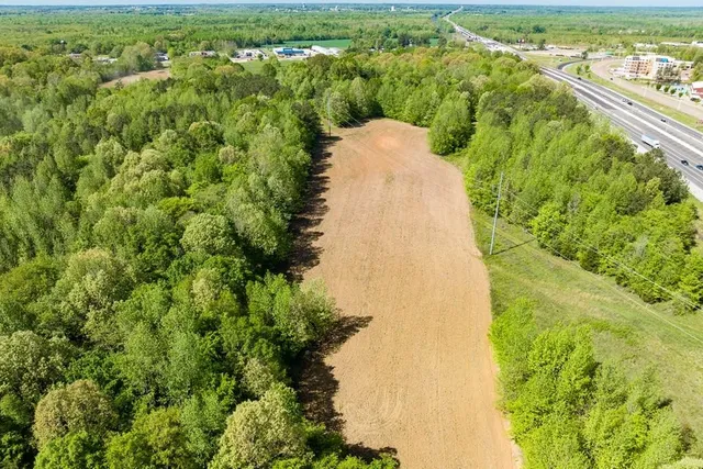 a view of a lake with a city