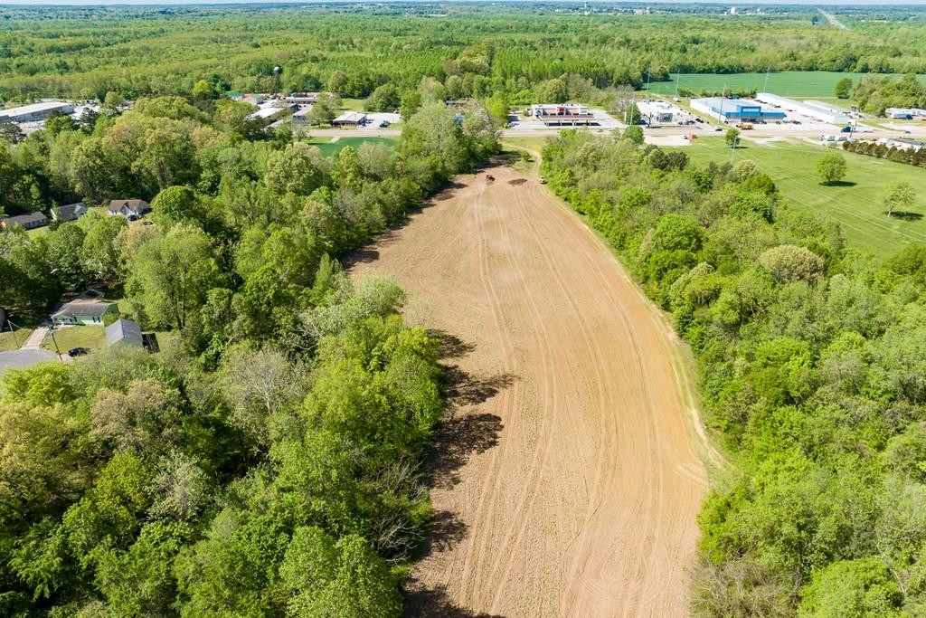 0 West Interstate 40 Expressway Jackson, TN 38301 - Photo 10 of 12 an aerial view of residential houses with outdoor space and trees