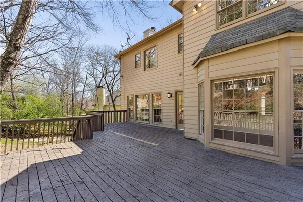 a view of a house with a roof deck
