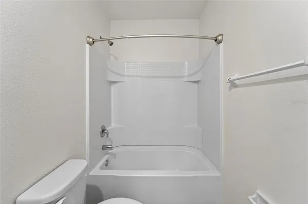 a view of a room with yard from a window