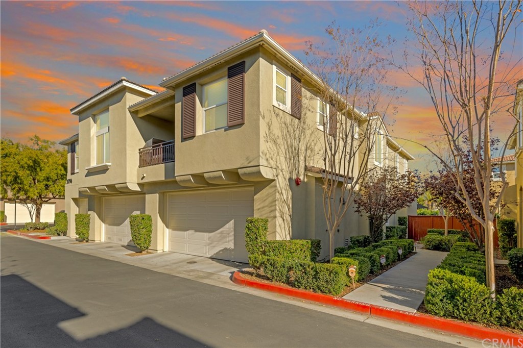 35794 Springvale Lane, Unit 3 Murrieta, CA 92562 - Photo 1 of 1 a front view of a house with garden