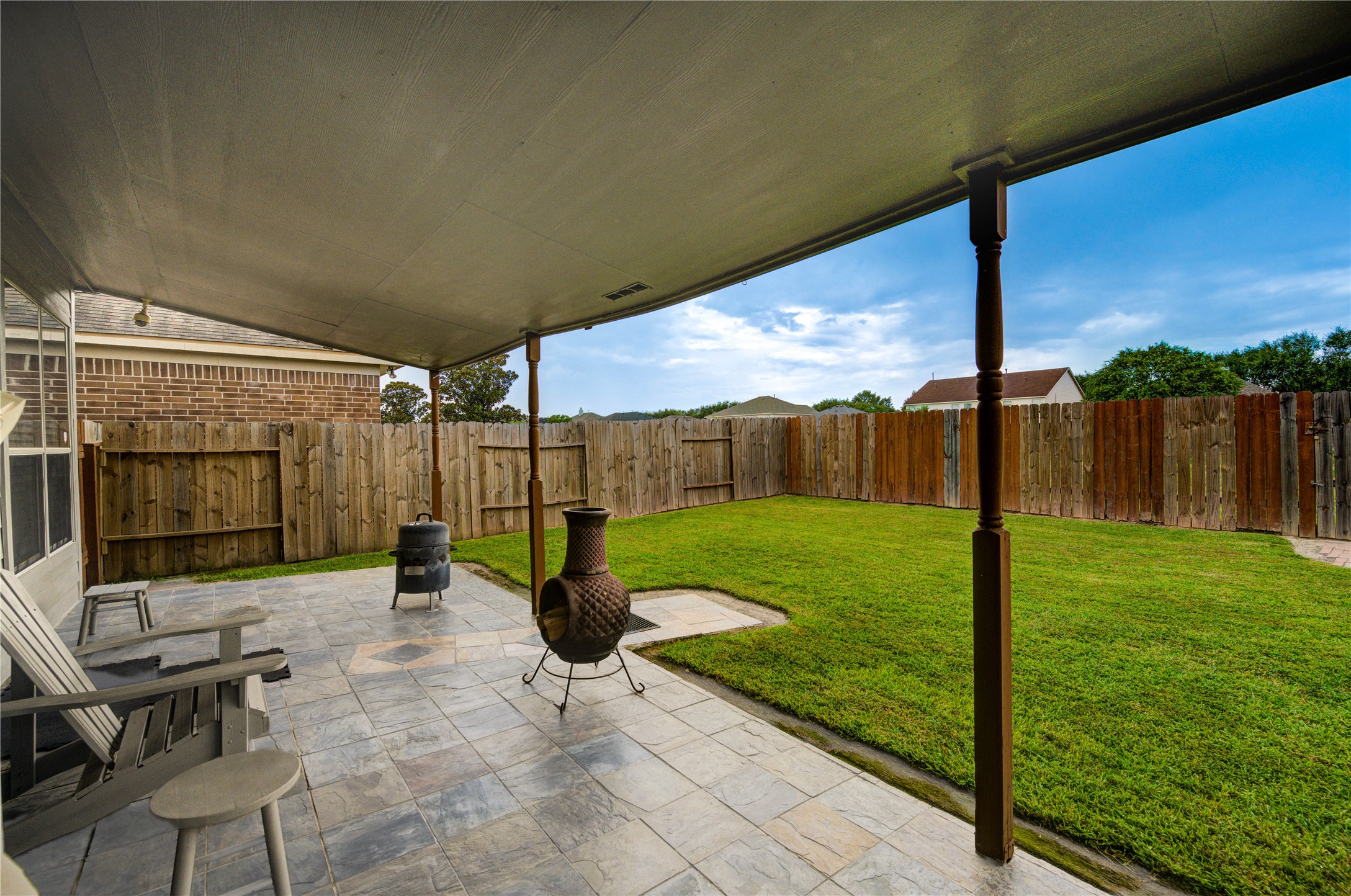 16730 Spring Barker Drive Cypress, TX 77429 - Photo 50 of 50 a view of a backyard with a garden and chairs