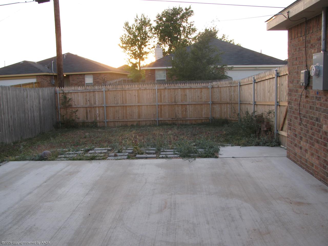 4816 Mammoth Lane Amarillo, TX 79110 - Photo 8 of 9 a view of a backyard