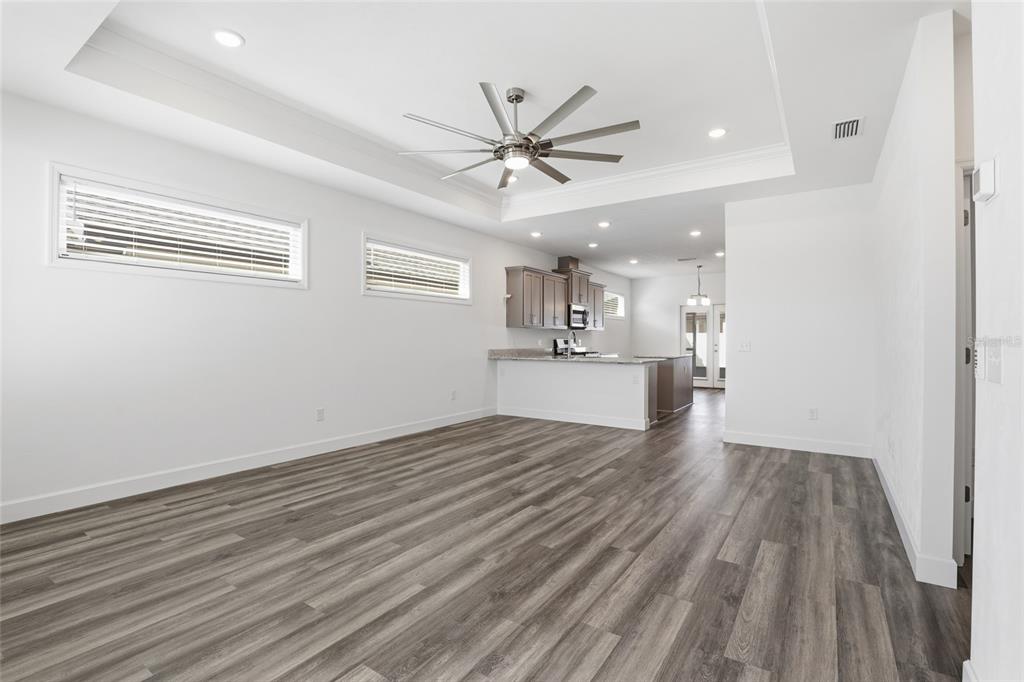 24302 Southwest 18th Road Newberry, FL 32669 - Photo 14 of 30 a view of a livingroom with a hardwood floor