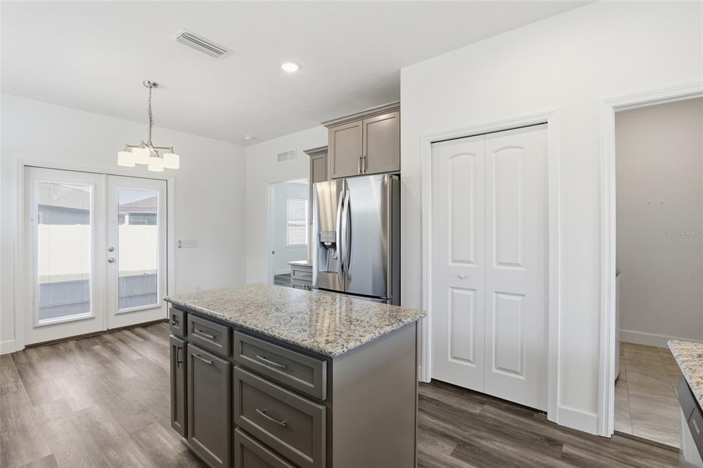 24302 Southwest 18th Road Newberry, FL 32669 - Photo 6 of 30 a bathroom with a granite countertop sink and a mirror