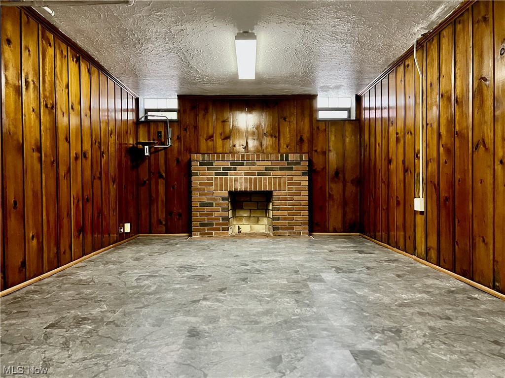 1242 Castleton Road Cleveland Heights, OH 44121 - Photo 31 of 32 Lower level family room with brick fireplace