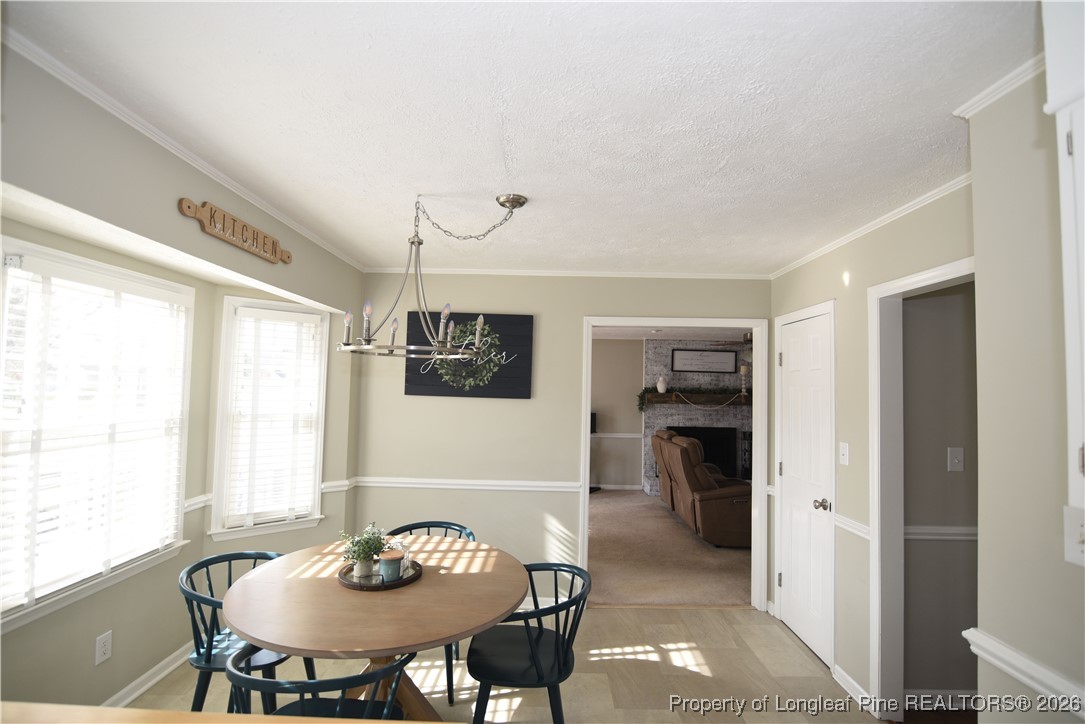 210 Tartan Road Lumberton, NC 28358 - Photo 16 of 38 a dining room with furniture and window
