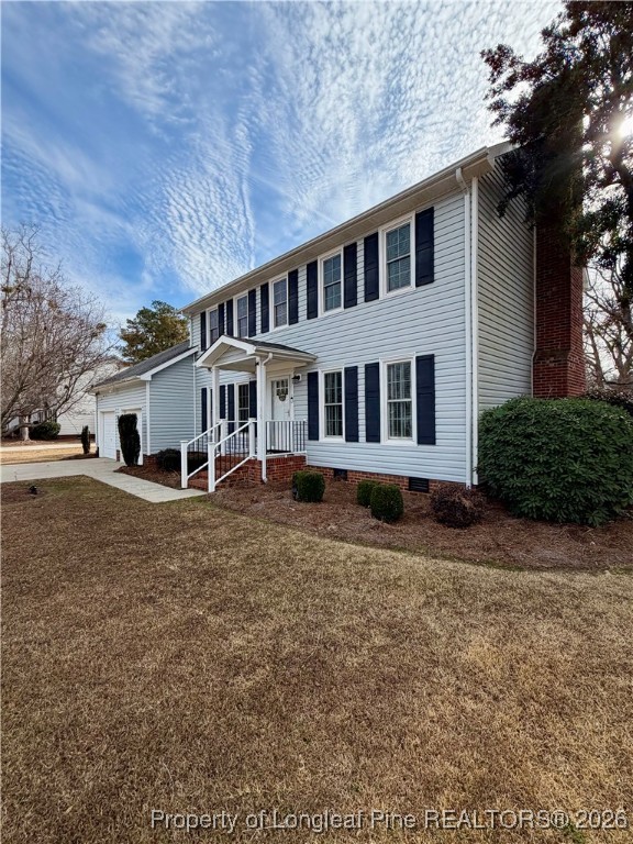210 Tartan Road Lumberton, NC 28358 - Photo 2 of 38 a house view with a garden space