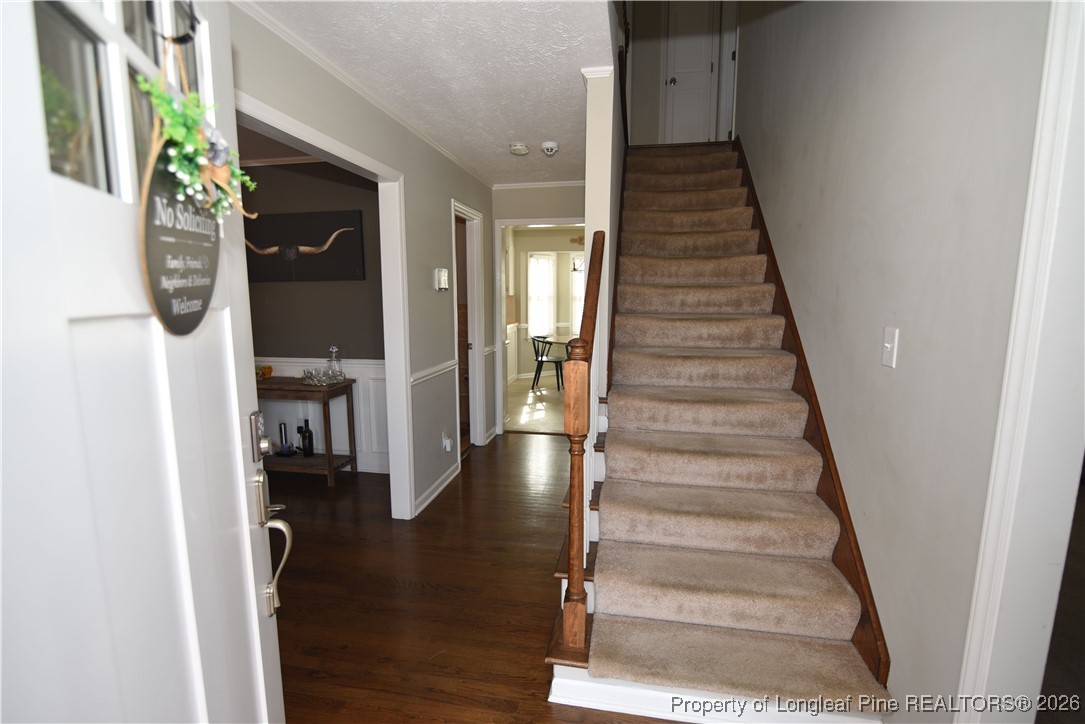 210 Tartan Road Lumberton, NC 28358 - Photo 3 of 38 a view of entryway and hall with wooden floor