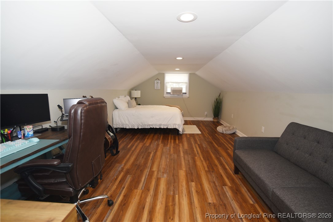 210 Tartan Road Lumberton, NC 28358 - Photo 31 of 38 a bedroom with bed and a couch