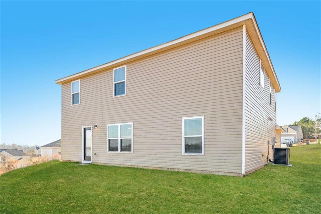 40 Tuesday Court Covington, GA 30016 - Photo 2 of 20 a view of a house with a yard