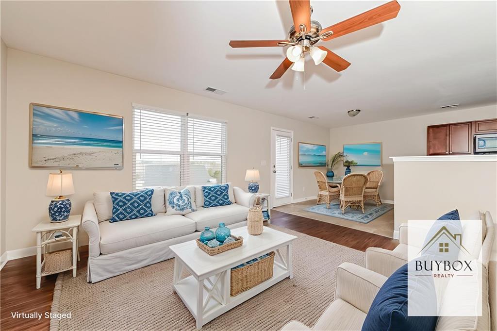 40 Tuesday Court Covington, GA 30016 - Photo 3 of 20 a living room with furniture and a window