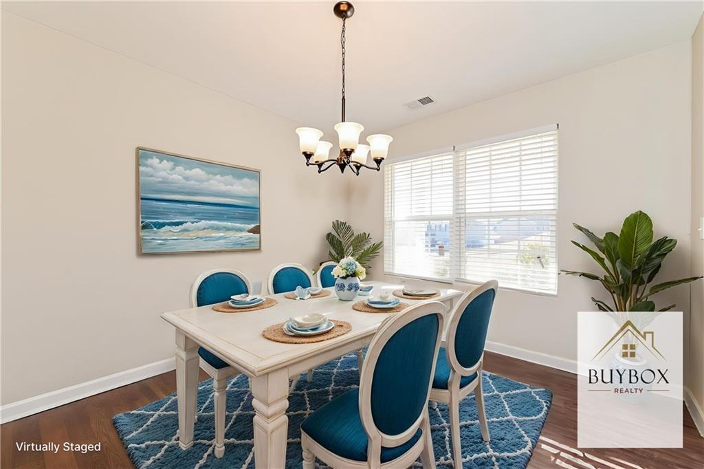 40 Tuesday Court Covington, GA 30016 - Photo 4 of 20 a dining room with furniture and window