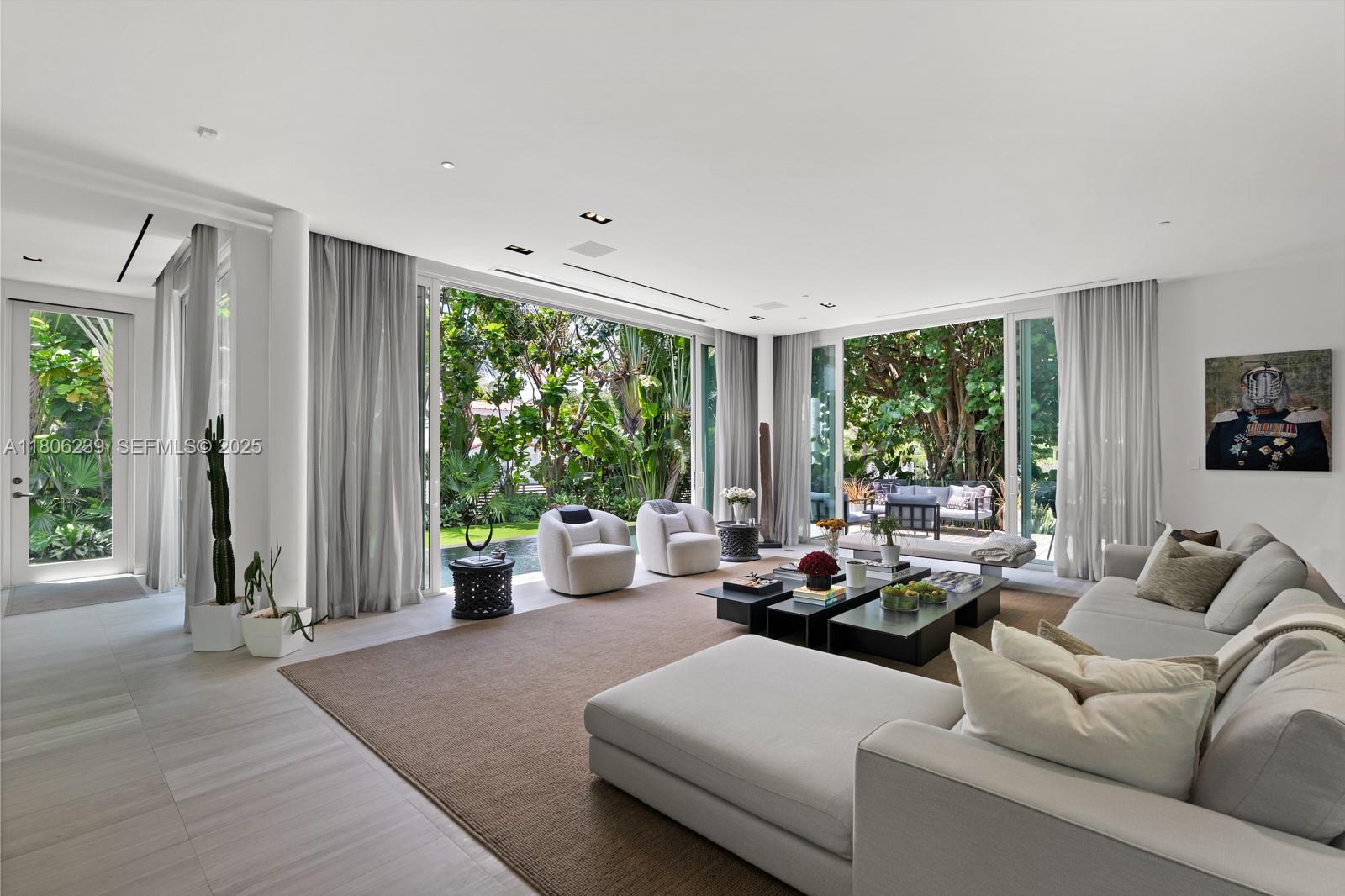 4700 Meridian Avenue Miami Beach, FL 33140 - Photo 12 of 64 a living room with furniture and a large window