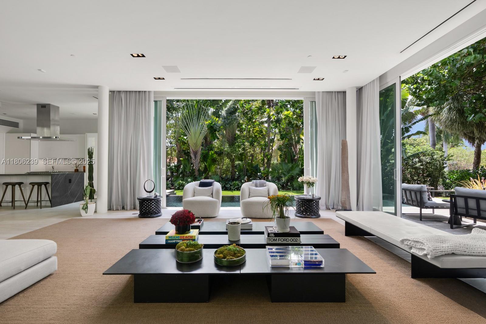 4700 Meridian Avenue Miami Beach, FL 33140 - Photo 13 of 64 a living room with furniture and a large window