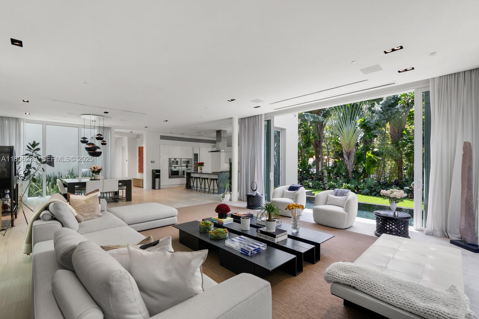 4700 Meridian Avenue Miami Beach, FL 33140 - Photo 15 of 64 a living room with furniture and a large window