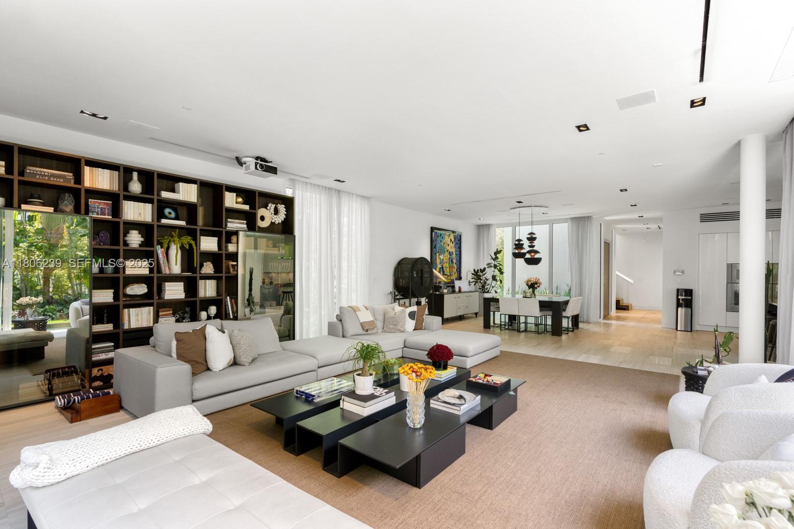 4700 Meridian Avenue Miami Beach, FL 33140 - Photo 16 of 64 a living room with furniture and large window