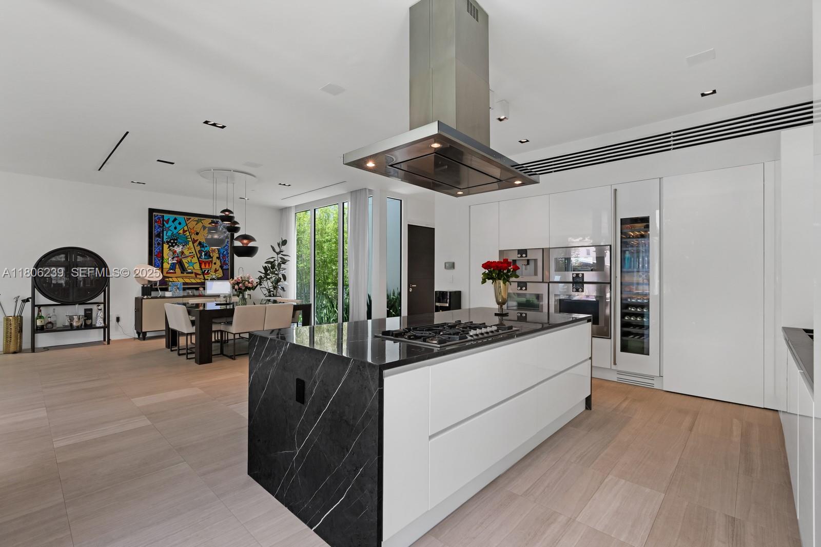 4700 Meridian Avenue Miami Beach, FL 33140 - Photo 22 of 64 a living room with furniture and a large window