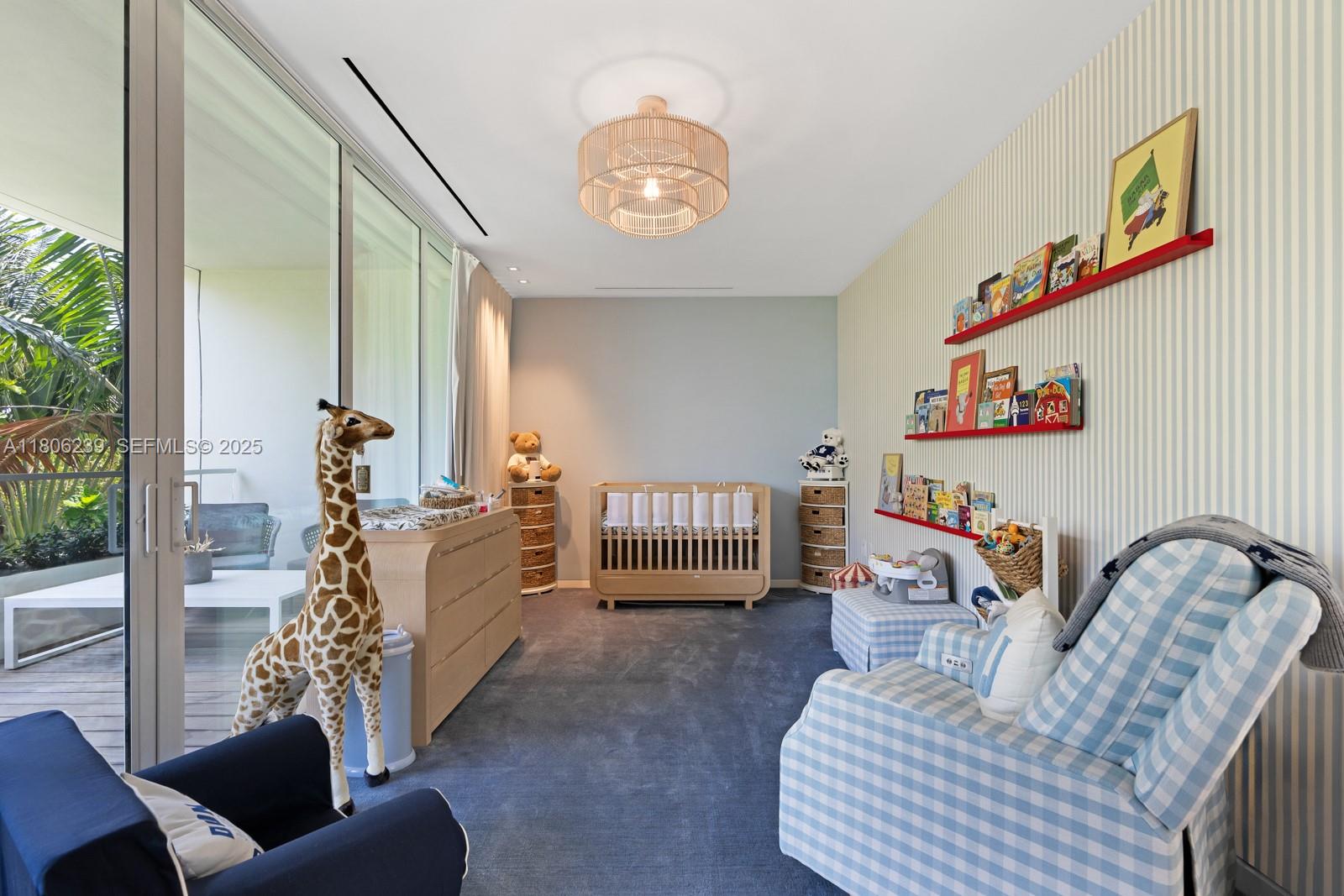 4700 Meridian Avenue Miami Beach, FL 33140 - Photo 41 of 64 a bedroom with furniture and a large window