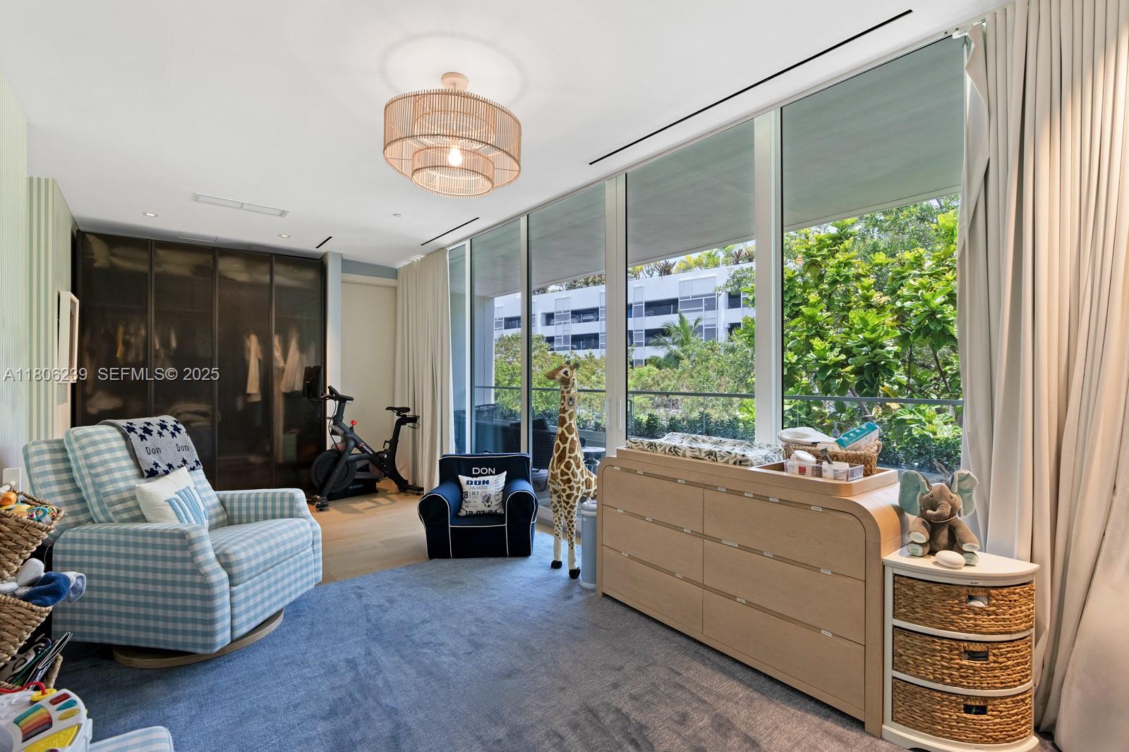 4700 Meridian Avenue Miami Beach, FL 33140 - Photo 42 of 64 a living room with furniture and a large window