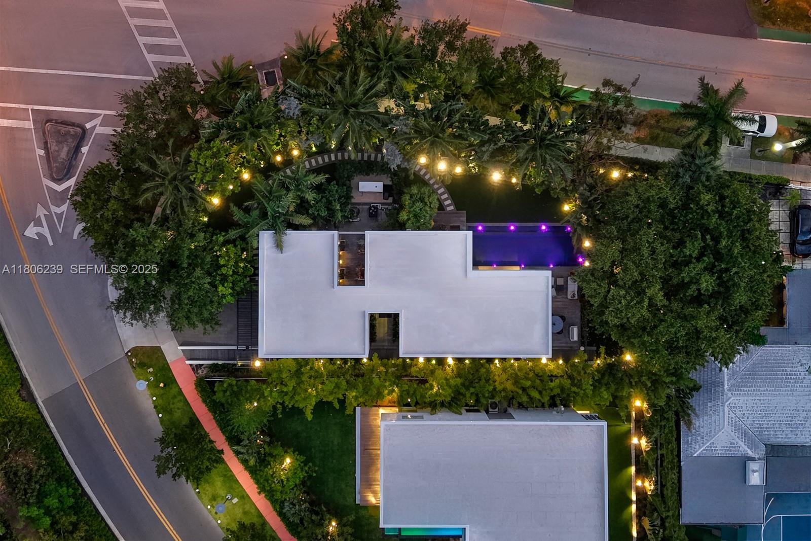 4700 Meridian Avenue Miami Beach, FL 33140 - Photo 60 of 64 an aerial view of house with swimming pool and garden