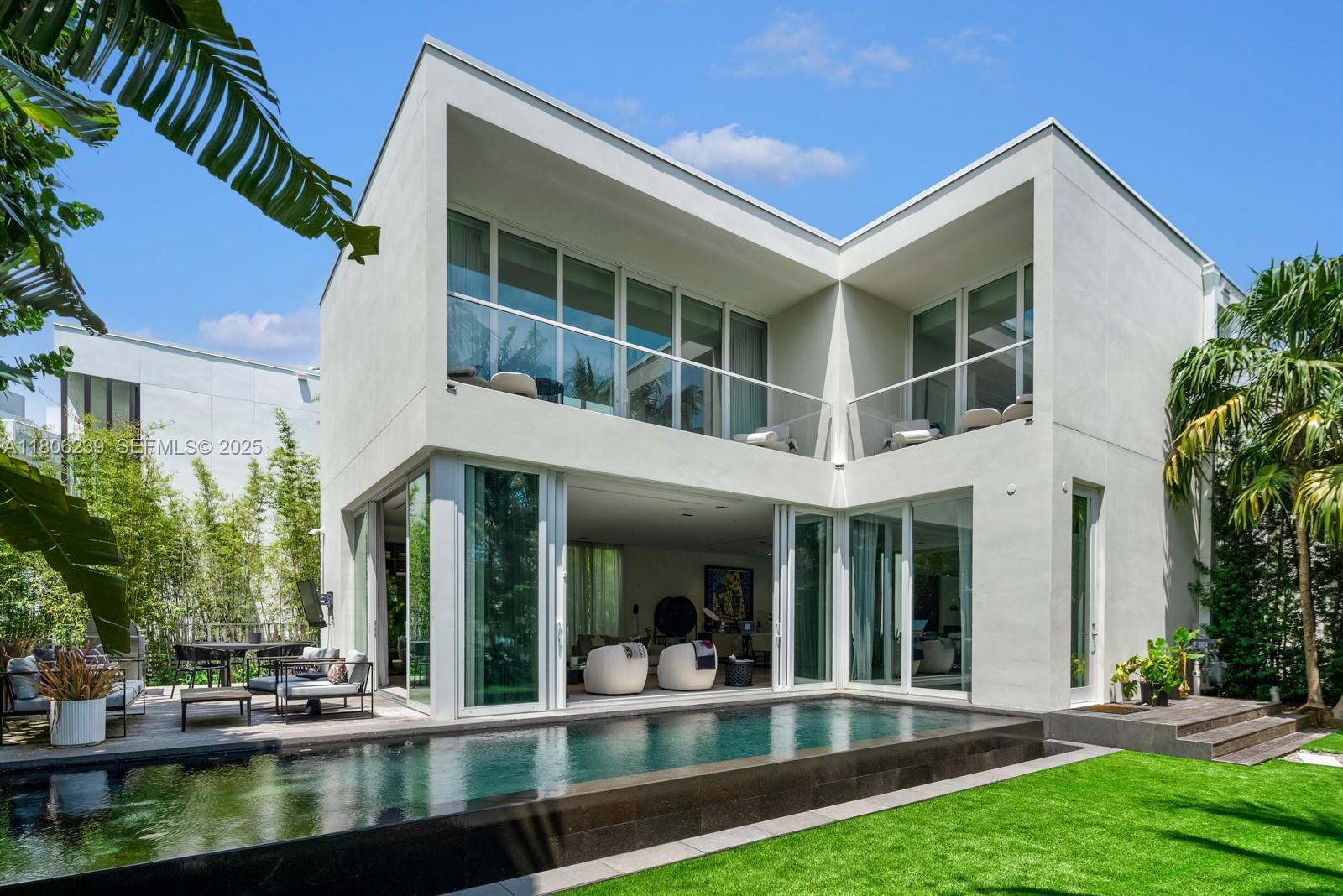 4700 Meridian Avenue Miami Beach, FL 33140 - Photo 8 of 64 a view of a building with a porch