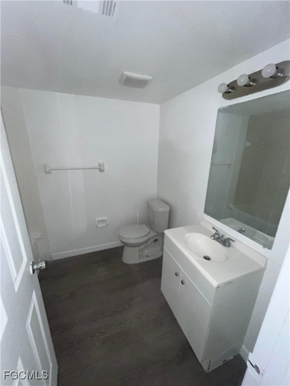 1919 Lillie Street, Unit H Fort Myers, FL 33916 - Photo 4 of 8 a bathroom with a sink and a toilet