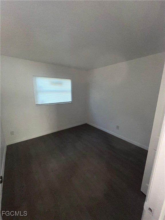 1919 Lillie Street, Unit H Fort Myers, FL 33916 - Photo 8 of 8 an empty room with a empty space